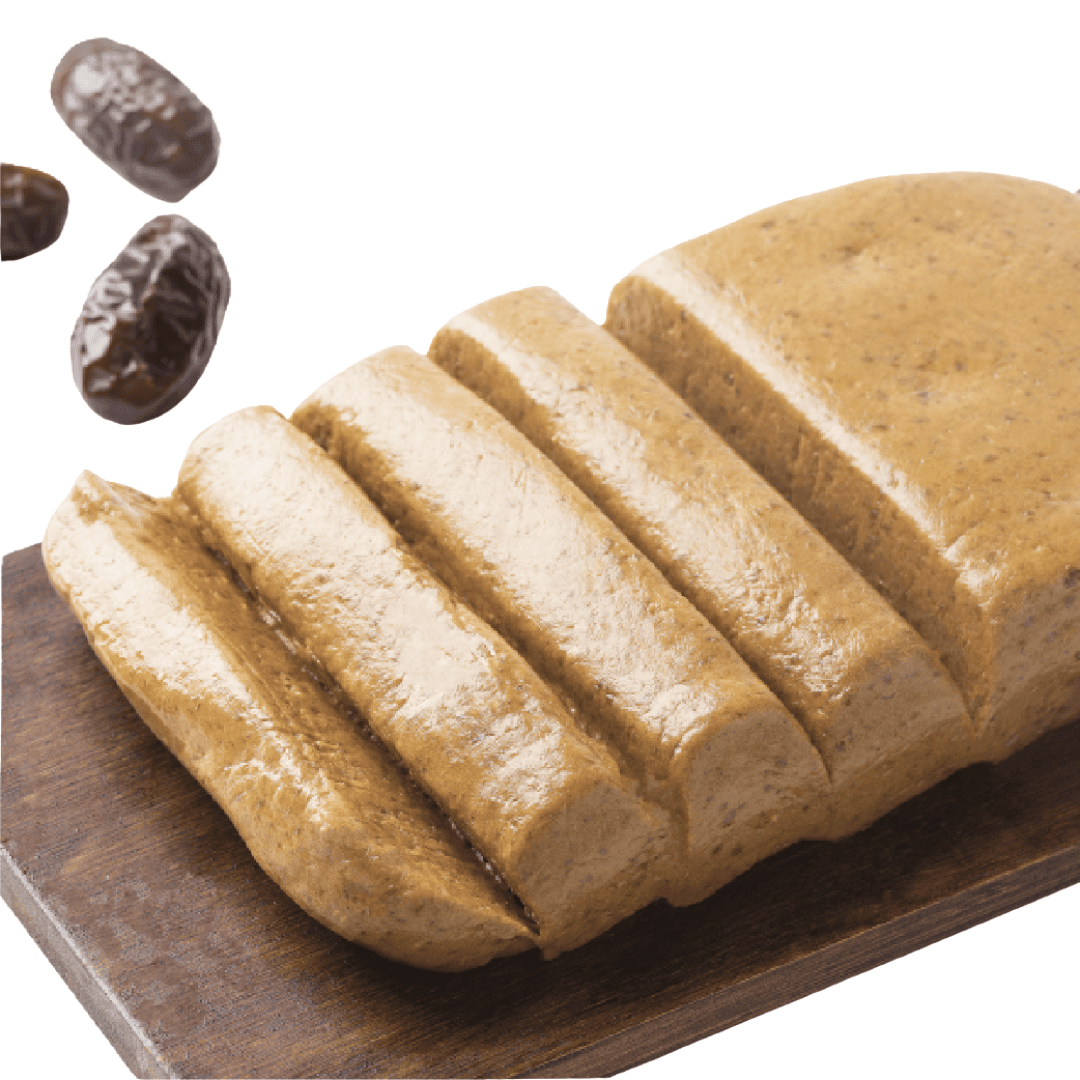 Dadelpasta bestellen? 100% puur en zonder toevoegingen, ideaal voor koken en bakken. Dadel Pasta - Nakheel Alya - 1KG op houten plank gesneden.